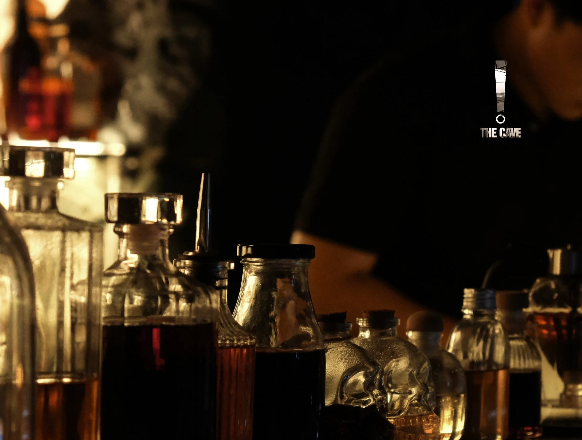Bottle details in warm bar light